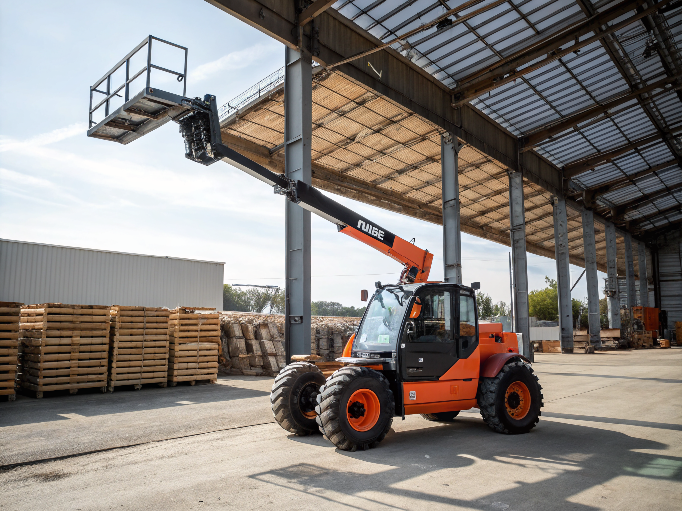Orange JLG telehandler with raised forks